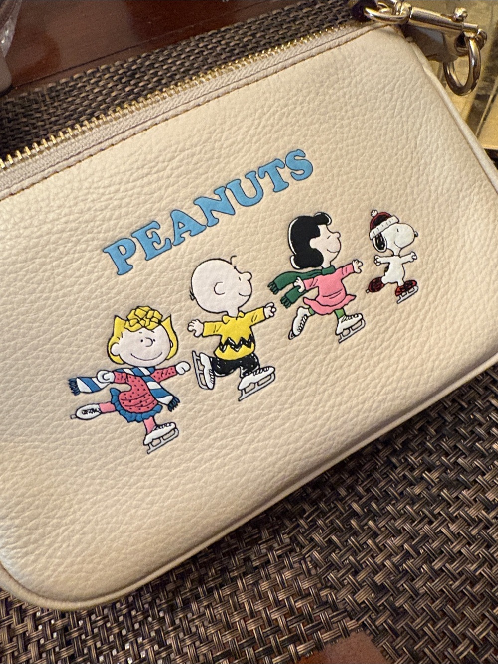 Coach new w tags Beige Peanuts Leather Mini Wristlet w Cartoon Print Retail 228